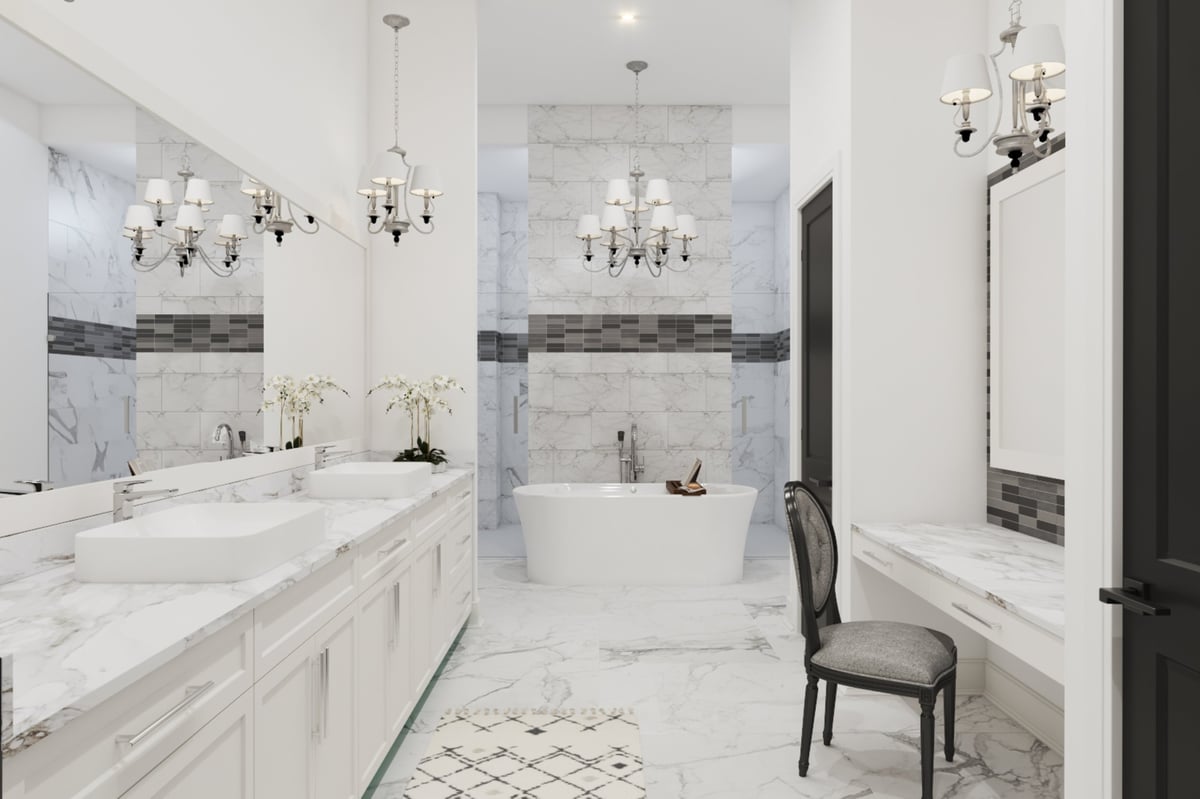 Luxurious bathroom with freestanding tub and marble finishes by Hansen Home Builders in Walton County Florida